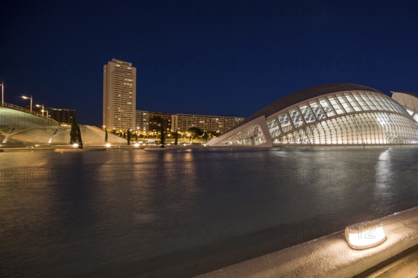 Valencia Spain Night scene with modern building and skyscraper on the calm water City of Arts and Sciences