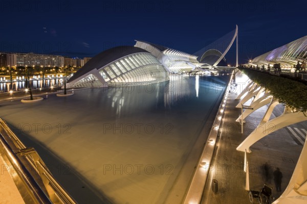Valencia Spain Elegant modern buildings on the waterfront at night with reflections City of Arts and Sciences