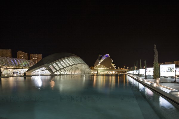 Valencia Spain Nocturnal urban scenery with illuminated modern buildings and water City of Arts and Sciences