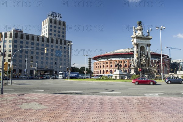Urban street scene with modern and historic building under a blue sky
