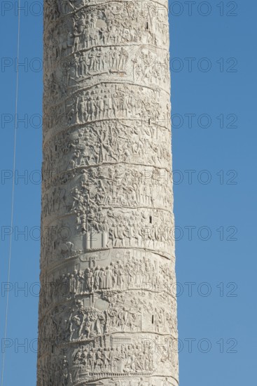 Detail of spiral marble relief on column of honour Victory Column Trajan's Column from year 113 with scenes from wars against the Dacians made of Carrara marble from Lunensian marble for Roman Emperor Trajan from antiquity in Trajan's Forum in ancient Rome, Rome, Lazio, Italy