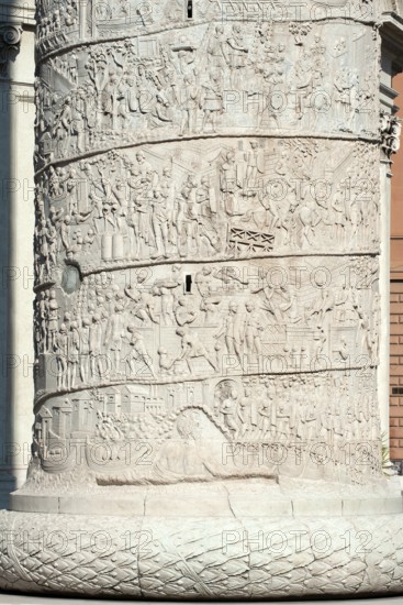 Detail of spiral marble relief on column of honour Victory Column Trajan's Column from year 113 in Lunensian marble Carrara marble for Roman Emperor Trajan from antiquity in Trajan's Forum in ancient Rome, Rome, Lazio, Italy