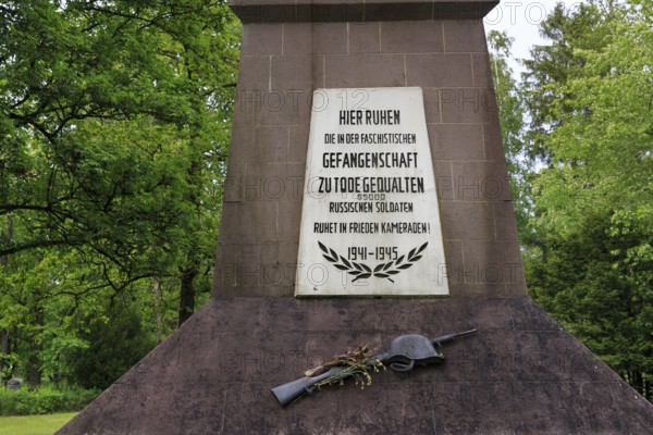 Obelisk with inscription, cemetery of honour of Soviet war dead, prisoner-of-war camp, World War II, Stalag 326 VI K Senne memorial, Schloss Holte-Stukenbrock, Senne nature reserve, North Rhine-Westphalia, Germany