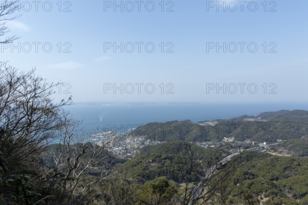 View of the sea and the town of Hama-Kanaya just in front of the summit of Mount Nokogiri, Mount Nokogiri, mountain landscape along the Shariki-michi Trail, Hamakanaya, Futtsu, Chiba Prefecture, Japan