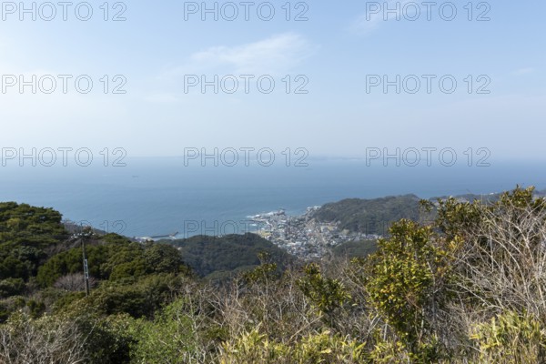 View of the sea and the town of Hama-Kanaya just in front of the summit of Mount Nokogiri, Mount Nokogiri, mountain landscape along the Shariki-michi Trail, Hamakanaya, Futtsu, Chiba Prefecture, Japan
