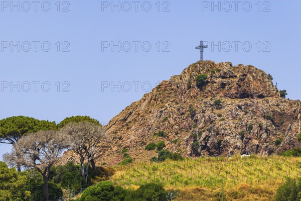 Giant steel cross on Monte Mar di Capanna, above Porto Azzurro, Elba Island, Tuscan Archipelago National Park, Tuscany, Italy