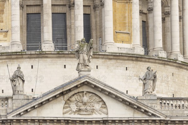 St. Pauls cathedral close up of figures on the outside of the building, City of London, England, United Kingdom