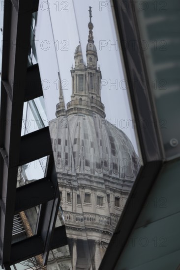 Dome of St. Pauls cathedral reflected in a building, City of London, England, United Kingdom