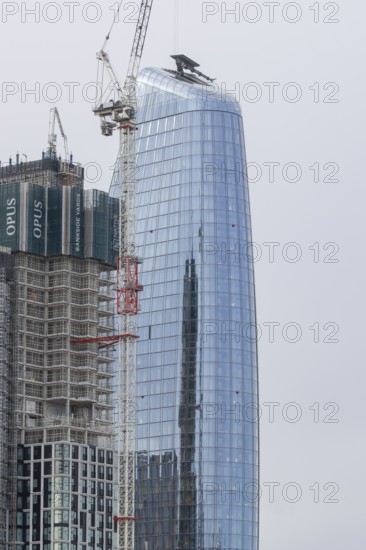 Mechanical crane on a skyscraper building, City of London, England, United Kingdom