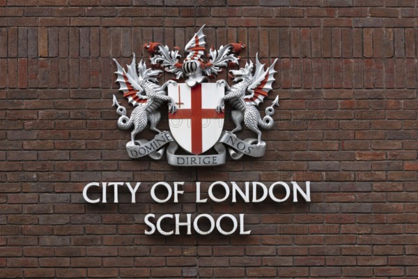 City of London school sign and coat of arms on a building, City of London, England, United Kingdom