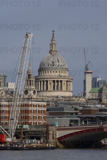 Dome of St. Pauls cathedral overlooking the river Thames, City of London, England, United Kingdom
