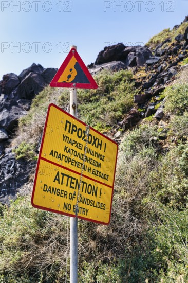 Signs warning of landslide and falling rocks, no entry, cliffs, Red Beach, Kokkini Paralia, Akrotiri, Santorini, Cyclades, Greece