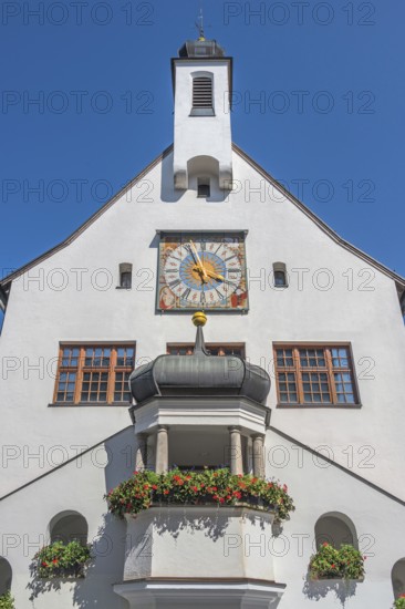 West façade with clock and floral decoration, town hall, Kempten, Allgäu, Bavaria, Germany