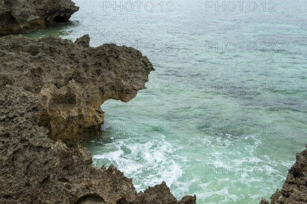 Sesoko's tail, rock formation, rugged cliffs of volcanic rock at the southern tip of Sesoko-jima, Sesoko Island, Motobu, Kunigami District, Okinawa, Japan