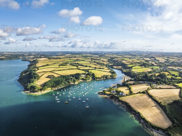 Farms and Fields over St Mawes from drone, Carrick Roads, River Fal, Falmouth, Cornwall, UK