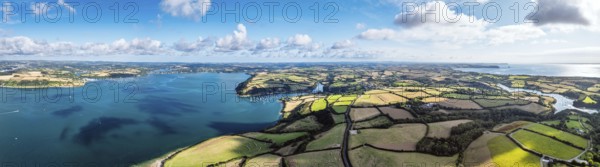 Panorama of Farms and Fields over St Mawes from drone, Carrick Roads, River Fal, Falmouth, Cornwall, UK