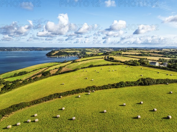 Farms and Fields over St Mawes from drone, Carrick Roads, River Fal, Falmouth, Cornwall, UK