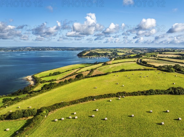 Farms and Fields over St Mawes from drone, Carrick Roads, River Fal, Falmouth, Cornwall, UK