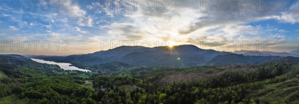 Panorama of Sunset over Mountains and Coniston Water from drone, Lake District National Park, Cumbria, England, United Kingdom