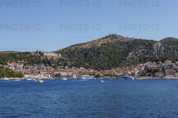 View of the harbour and the town of Hvar from the sea, island of Hvar, Dalmatia, Croatia