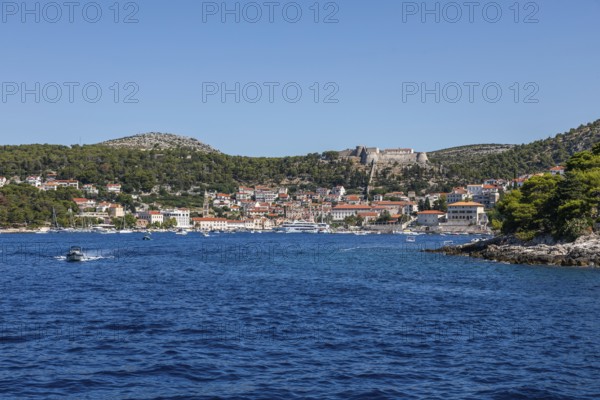 View of the harbour and the town of Hvar from the sea, island of Hvar, Dalmatia, Croatia