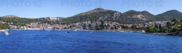 View from the sea to the harbour and the town of Hvar, panoramic view, island of Hvar, Dalmatia, Croatia