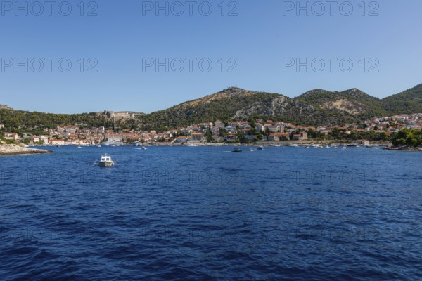 View from the sea to the harbour and the town of Hvar, panoramic view, island of Hvar, Dalmatia, Croatia