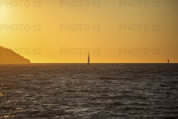 Sunset over the sea, sailing ship, near Starigrad, Dalmatia, Croatia