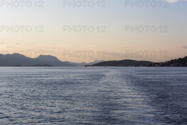 View from the sea to the Makarska mountains in the morning light, near Korcula, Dalmatia, Croatia