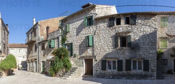 Trg Skor, Skor Square, panoramic view, stone houses in the old town centre, Starigrad, island of Hvar, Dalmatia, Croatia