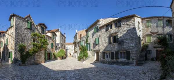Trg Skor, Skor Square, panoramic view, stone houses in the old town centre, Starigrad, island of Hvar, Dalmatia, Croatia
