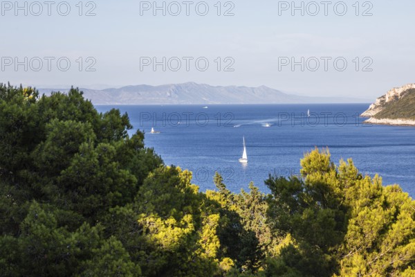 View from the island of Vis to the island of Hvar, sailing ships off the bay of the town of Vis, island of Vis, Mediterranean Sea, Dalmatia, Croatia