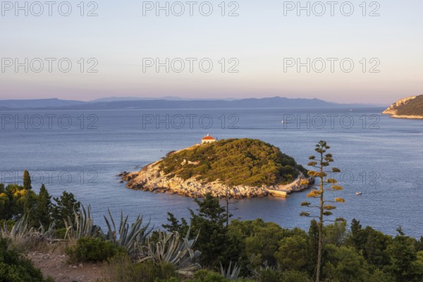 View from the island of Vis to the island of Hvar, small offshore island in the bay of the town of Vis, island of Vis, Mediterranean Sea, Dalmatia, Croatia