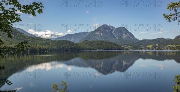 Peaceful lake surface with mountain panorama, Dachstein and Sarstein, cloud reflection in the water, Altaussee, Styria, Austria