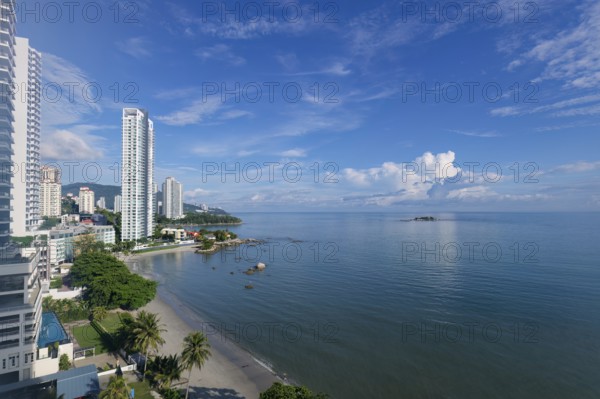 Penang skyline and beach on the Malacca Straits, Penang, Malaysia