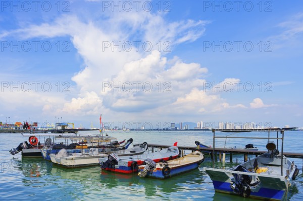 Anchored motorboats at Chew jetty, George Town, Penang, Malaysia