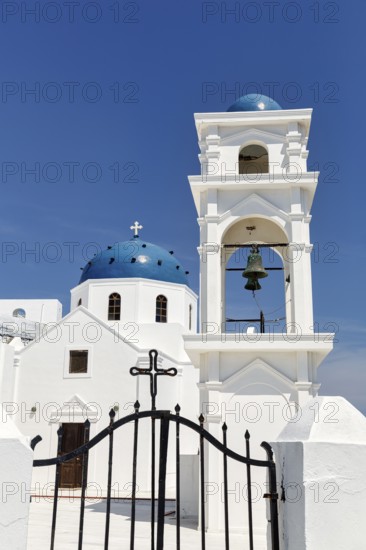 White, orthodox church of Agios Anastasios with blue dome and bell tower, Imerovigli, Thira, Santorini, Cyclades, Greece