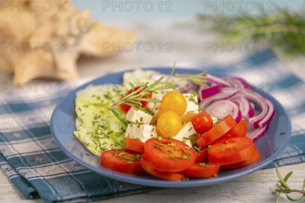 Plate with vegetables and feta in a maritime atmosphere