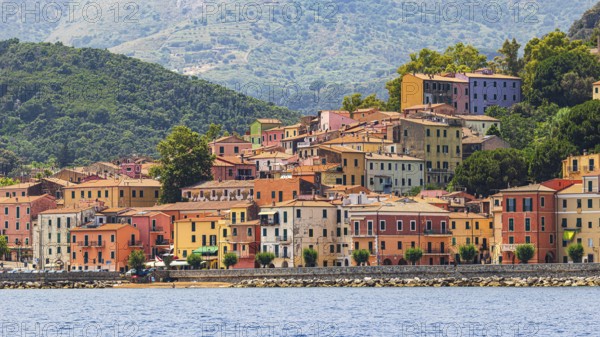 The village of Rio Marina with its pastel-coloured house facades, Elba Island, Tuscan Archipelago National Park, Tuscany, Italy