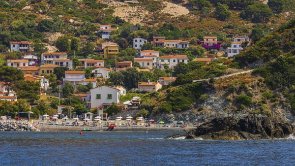 The village of Pomonte with a small beach, Elba Island, Tuscan Archipelago National Park, Tuscany, Italy