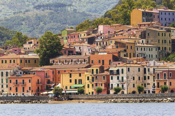 The village of Rio Marina with its pastel-coloured house facades, Elba Island, Tuscan Archipelago National Park, Tuscany, Italy