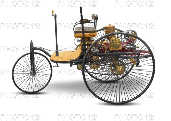 Replica of a old historic vehicle named patent motorcar isolated in white back with shadow
