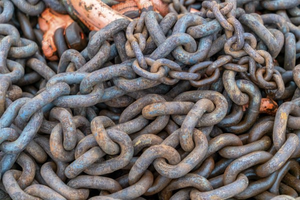 Detail shot of tangled rusty chains