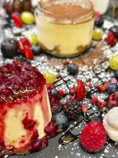 Various desserts with berries and chocolate, skilfully arranged on a plate Lower Austria Austria