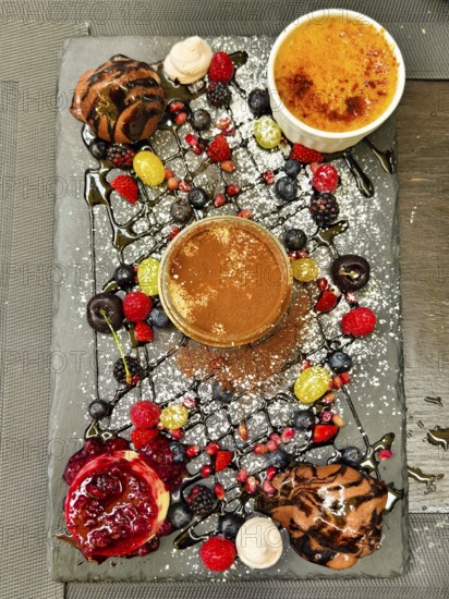 Various art desserts with chocolate and fruit on a decorative platter Lower Austria Austria