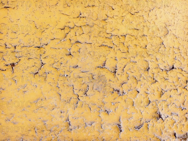 Yellow wall with cracked and peeling surface Lower Austria Austria