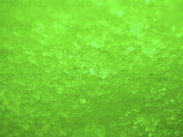 Green illuminated ice crystals as background, blurred background, North Rhine-Westphalia, Germany