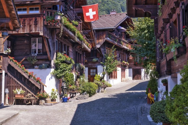 Alley with old wooden houses in Brienz, Canton of Bern, Switzerland