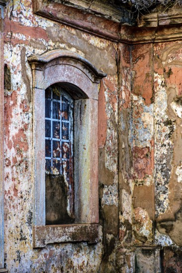 Window of an old historic mansion in ruin in the city of Ouro Preto in Minas Gerais, Ouro Preto, Minas Gerais, Brazil