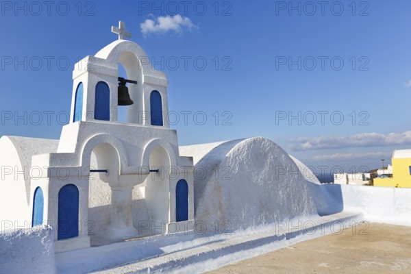 Bell tower, orthodox church, white and blue, Oia, Thira, Santorini, Cyclades, Greece